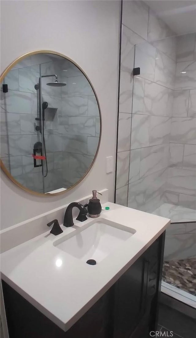 11022 Maple St, Whittier, CA 90601 - bathroom featuring vanity and a walk in shower