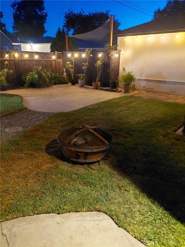 11022 Maple St, Whittier, CA 90601 - yard at night with a patio area