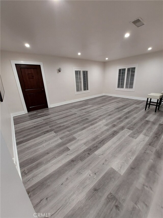 11022 Maple St, Whittier, CA 90601 - unfurnished living room with recessed lighting and wood finished floors