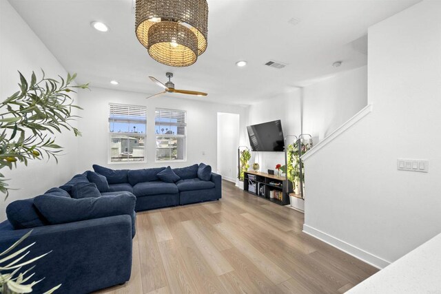7641 University Ave Unit 105, La Mesa, CA 91942 - living room featuring wood finished floors, recessed lighting, baseboards, and a ceiling fan