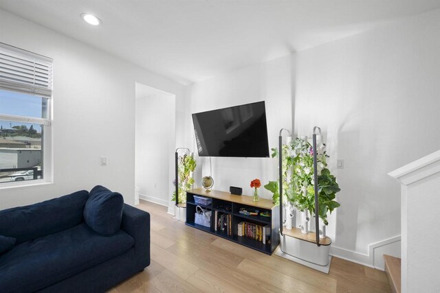 7641 University Ave Unit 105, La Mesa, CA 91942 - living room featuring light wood-type flooring, recessed lighting, and baseboards