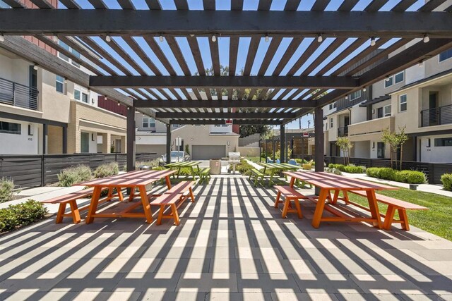 7641 University Ave Unit 105, La Mesa, CA 91942 - view of patio / terrace featuring a residential view and outdoor dining space