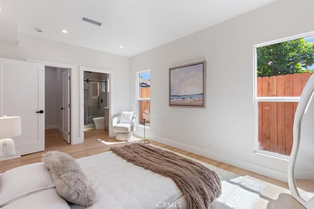 22452 Dolorosa St, Woodland Hills, CA 91367 - bedroom featuring multiple windows, light wood-style floors, baseboards, and recessed lighting