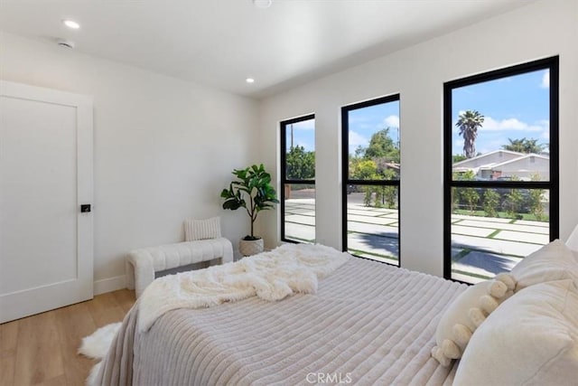 22452 Dolorosa St, Woodland Hills, CA 91367 - bedroom with light wood-style flooring, baseboards, and recessed lighting