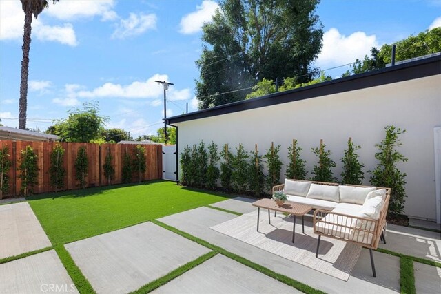 22452 Dolorosa St, Woodland Hills, CA 91367 - view of yard featuring an outdoor living space, a patio, and a gate