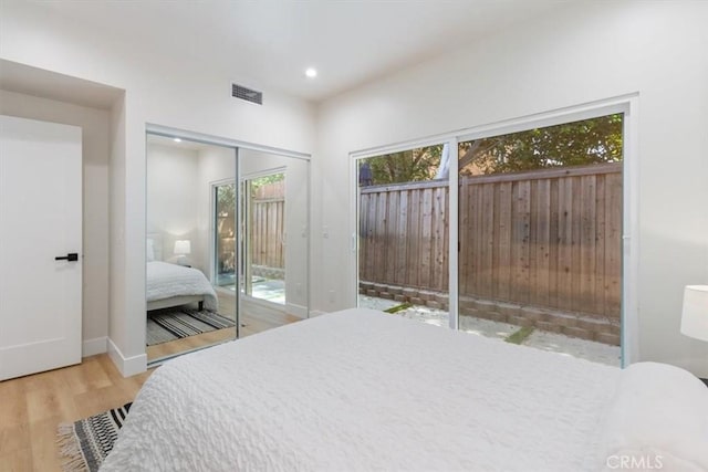 22452 Dolorosa St, Woodland Hills, CA 91367 - bedroom with wood finished floors, access to outside, recessed lighting, baseboards, and a closet