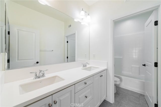 3407 Paseo Dr, Brea, CA 92823 - bathroom with toilet, double vanity, tile patterned flooring, and shower / washtub combination