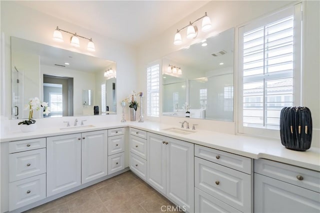 3407 Paseo Dr, Brea, CA 92823 - bathroom with double vanity, tile patterned floors, and a shower