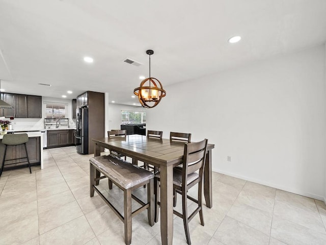 1562 Richandave Ave, El Cajon, CA 92019 - dining room featuring a chandelier, recessed lighting, light tile patterned floors, and baseboards