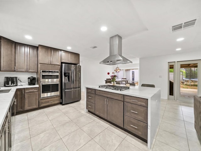 1562 Richandave Ave, El Cajon, CA 92019 - kitchen featuring appliances with stainless steel finishes, range hood, dark brown cabinets, and recessed lighting