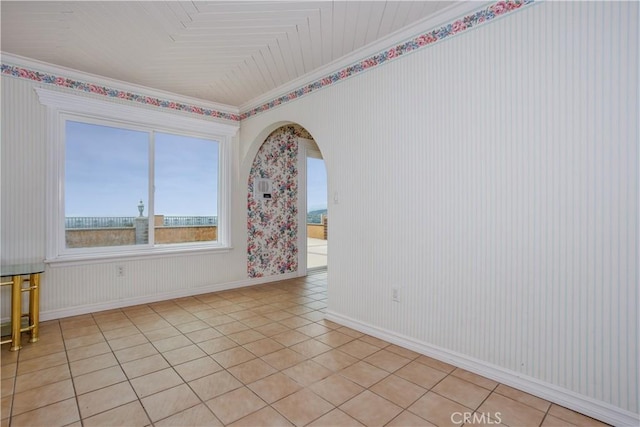 350 Roughrider Rd, La Verne, CA 91750 - unfurnished room featuring crown molding, light tile patterned floors, arched walkways, baseboards, and wallpapered walls
