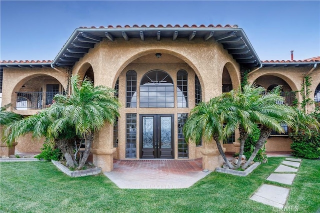 350 Roughrider Rd, La Verne, CA 91750 - doorway to property with french doors, stucco siding, a yard, and a tile roof