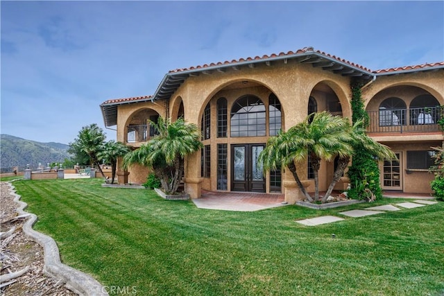 350 Roughrider Rd, La Verne, CA 91750 - back of property with french doors, stucco siding, a yard, and a balcony