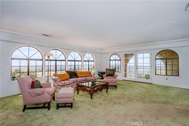 350 Roughrider Rd, La Verne, CA 91750 - carpeted living area featuring ornamental molding, a textured ceiling, baseboards, and french doors