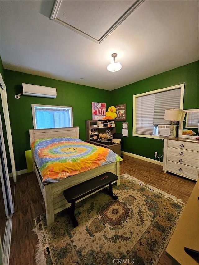 9740 La Canada Way, Shadow Hills, CA 91040 - bedroom with a wall mounted AC, wood finished floors, and baseboards