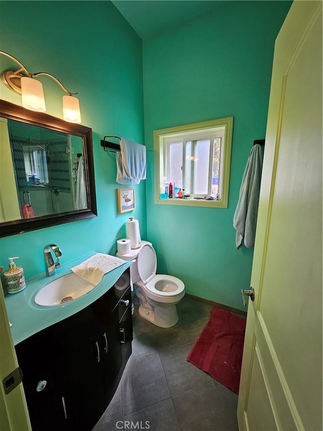 9740 La Canada Way, Shadow Hills, CA 91040 - full bathroom featuring toilet, vanity, tile patterned floors, a shower, and baseboards