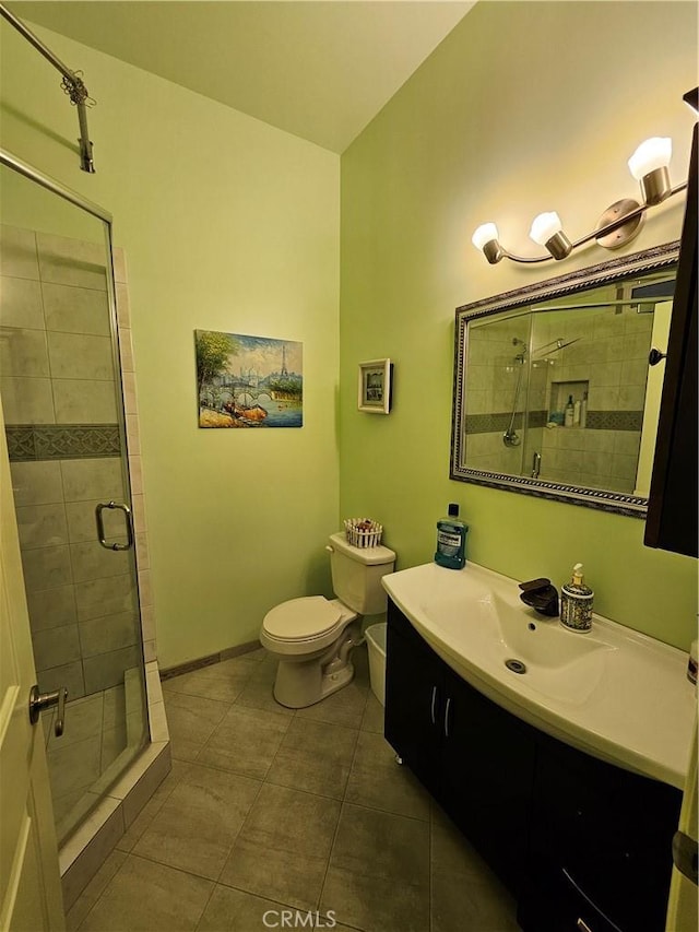 9740 La Canada Way, Shadow Hills, CA 91040 - full bath with a stall shower, toilet, tile patterned floors, vanity, and baseboards