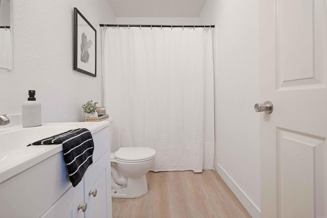 1025 4th Ave Unit 8, Chula Vista, CA 91911 - full bathroom featuring wood finished floors, vanity, toilet, and a shower with shower curtain