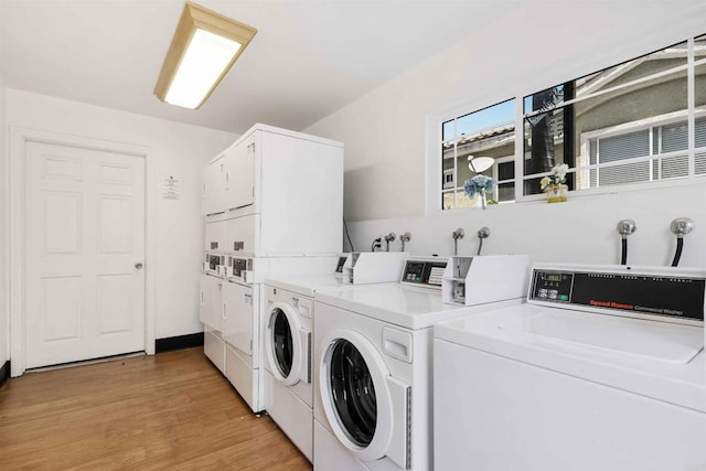 1025 4th Ave Unit 8, Chula Vista, CA 91911 - shared laundry room with stacked washer / dryer, separate washer and dryer, and light wood-style flooring