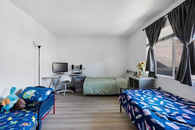 1025 4th Ave Unit 8, Chula Vista, CA 91911 - bedroom featuring wood finished floors and an office area