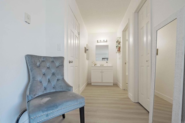 1025 4th Ave Unit 8, Chula Vista, CA 91911 - hallway with light wood-style flooring and baseboards