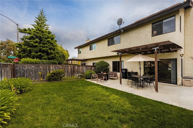 3516 Landsford Way, Carlsbad, CA 92010 - back of property featuring stucco siding, a patio area, a pergola, and a chimney