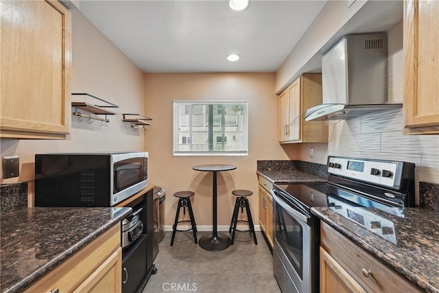 8121 Canby Ave Unit 4, Reseda, CA 91335 - kitchen with stainless steel appliances, wall chimney exhaust hood, light brown cabinetry, tasteful backsplash, and recessed lighting