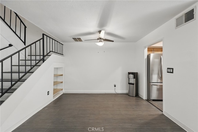 8121 Canby Ave Unit 4, Reseda, CA 91335 - unfurnished living room featuring ceiling fan, stairs, dark wood-type flooring, and baseboards