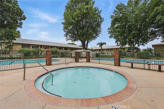 8121 Canby Ave Unit 4, Reseda, CA 91335 - community pool with a patio