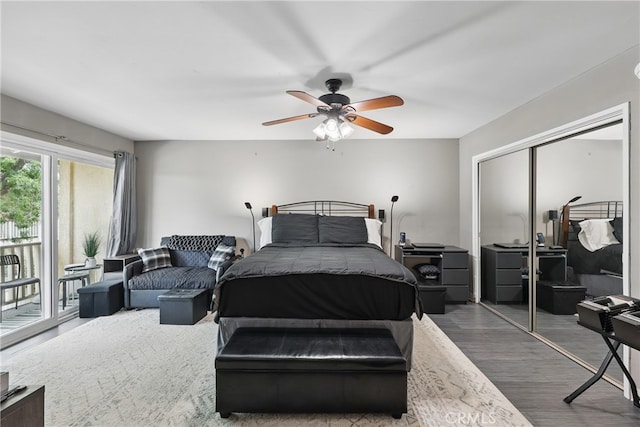 8121 Canby Ave Unit 4, Reseda, CA 91335 - bedroom with access to outside, wood finished floors, a closet, and ceiling fan