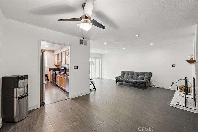 8121 Canby Ave Unit 4, Reseda, CA 91335 - living room with a ceiling fan, dark wood finished floors, and recessed lighting