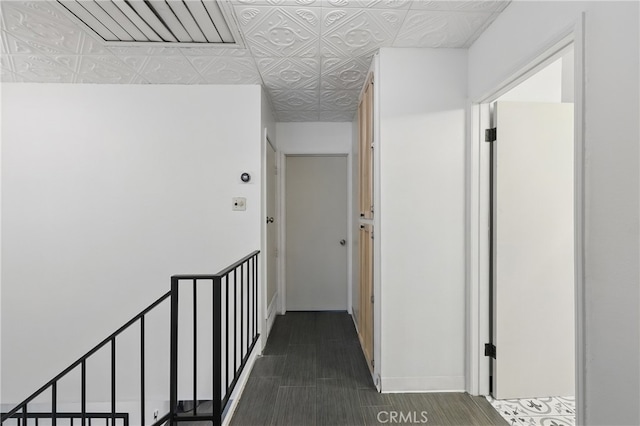 8121 Canby Ave Unit 4, Reseda, CA 91335 - hallway featuring baseboards and an ornate ceiling