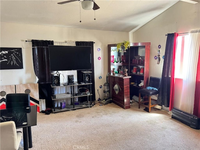 45529 Sancroft Ave, Lancaster, CA 93535 - carpeted living area featuring vaulted ceiling and a ceiling fan