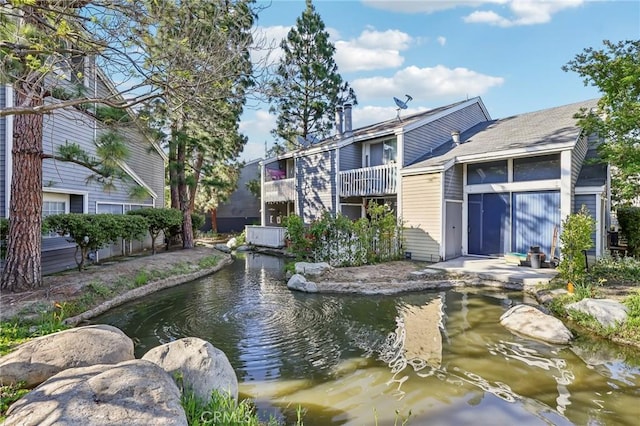 25447 Pine Creek Ln, Wilmington, CA 90744 - view of community featuring a small pond