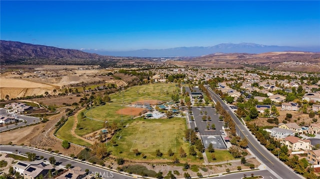 11066 Guffey Ranch Way, Corona, CA 92883 - aerial overview of property's location with mountains and nearby suburban area