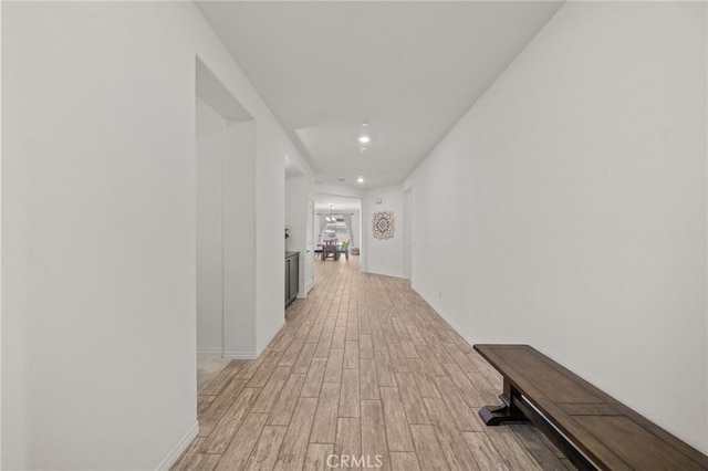 11066 Guffey Ranch Way, Corona, CA 92883 - hallway featuring recessed lighting, light wood-type flooring, and baseboards