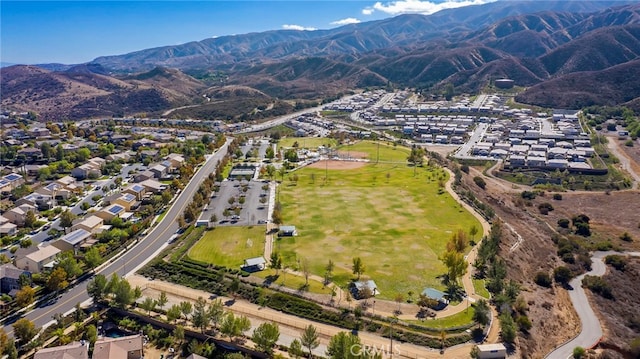 11066 Guffey Ranch Way, Corona, CA 92883 - aerial view of property's location with nearby suburban area and a mountainous background