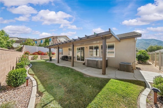 11066 Guffey Ranch Way, Corona, CA 92883 - rear view of house featuring a hot tub, a patio, central AC, and stucco siding