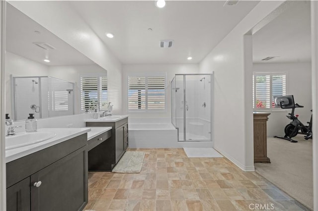 11066 Guffey Ranch Way, Corona, CA 92883 - bathroom with a shower stall, two vanities, a bath, recessed lighting, and stone finish floors
