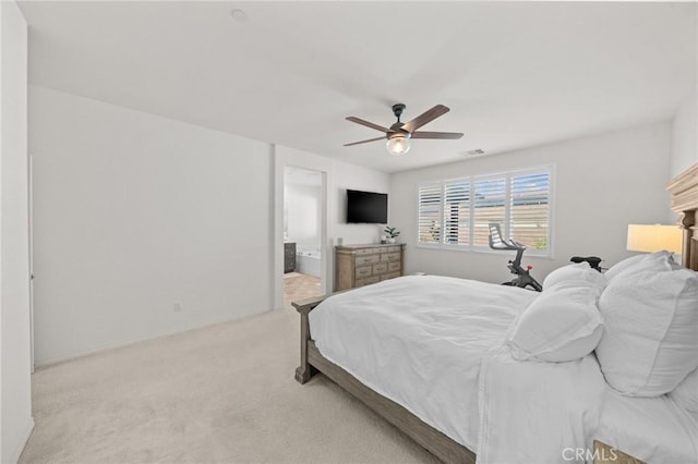 11066 Guffey Ranch Way, Corona, CA 92883 - carpeted bedroom with ceiling fan, connected bathroom, and baseboards