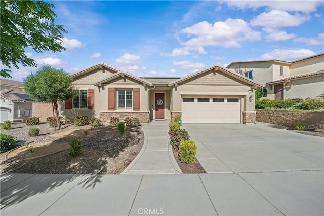 11066 Guffey Ranch Way, Corona, CA 92883 - view of front facade featuring an attached garage, concrete driveway, stone siding, stucco siding, and a tiled roof