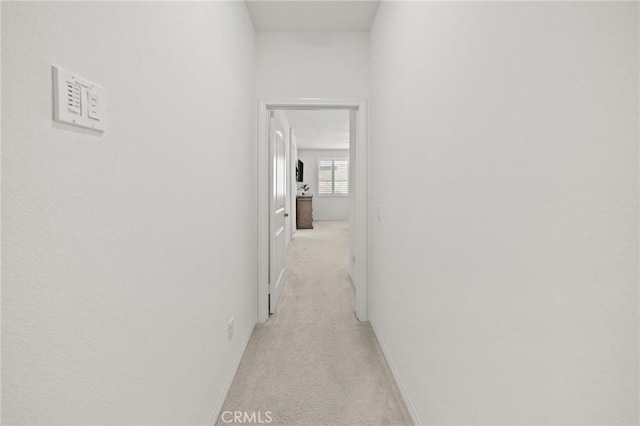 11066 Guffey Ranch Way, Corona, CA 92883 - hall with light colored carpet and baseboards