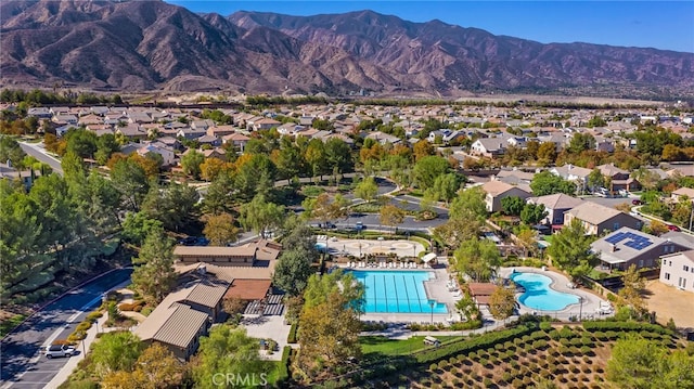 11066 Guffey Ranch Way, Corona, CA 92883 - aerial view of residential area with a pool area and mountains