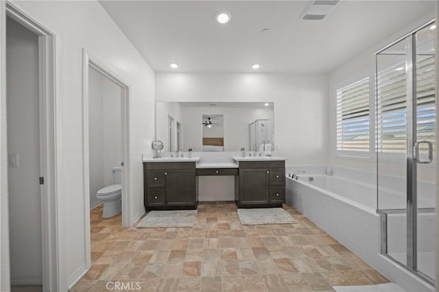 11066 Guffey Ranch Way, Corona, CA 92883 - full bathroom featuring vanity, a bath, a shower stall, stone finish flooring, and ceiling fan