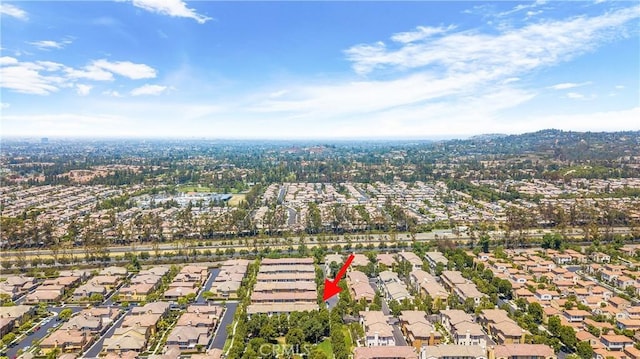 36 Chula Vis Unit 109, Irvine, CA 92602 - aerial view of property and surrounding area featuring nearby suburban area