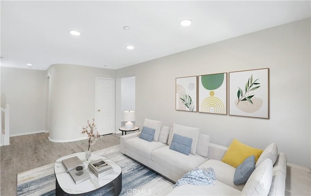 36 Chula Vis Unit 109, Irvine, CA 92602 - living area featuring baseboards, recessed lighting, and wood finished floors