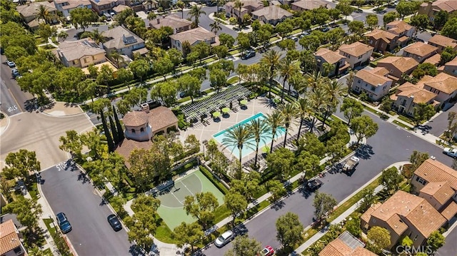 36 Chula Vis Unit 109, Irvine, CA 92602 - aerial view of property and surrounding area featuring a pool area and nearby suburban area