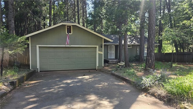 14093 Wingate Cir, Magalia, CA 95954 - view of front of house with asphalt driveway and a garage