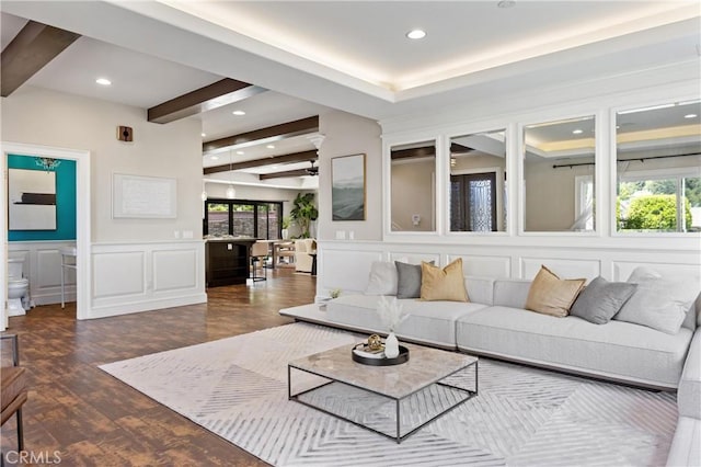 1202 Duke Ln, Walnut, CA 91789 - living area featuring a decorative wall, beam ceiling, dark wood-type flooring, recessed lighting, and a wainscoted wall