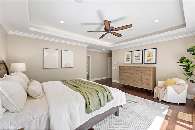 1202 Duke Ln, Walnut, CA 91789 - bedroom featuring a tray ceiling, hardwood / wood-style flooring, ornamental molding, recessed lighting, and baseboards